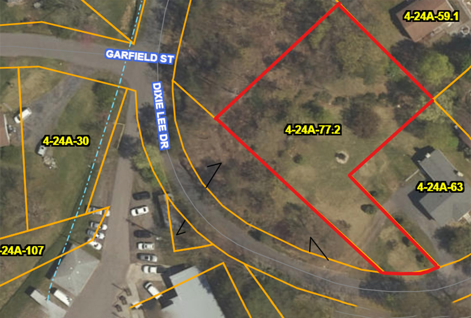 Aerial property map showing outlined land parcels with lot numbers, street names Garfield Street and Dixie Lee Drive, and a highlighted parcel marked in red.